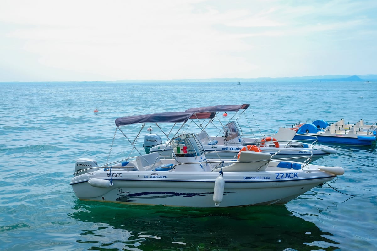 Garda, Italy - July 31, 2018: image of a boats on Garda lake in Italy