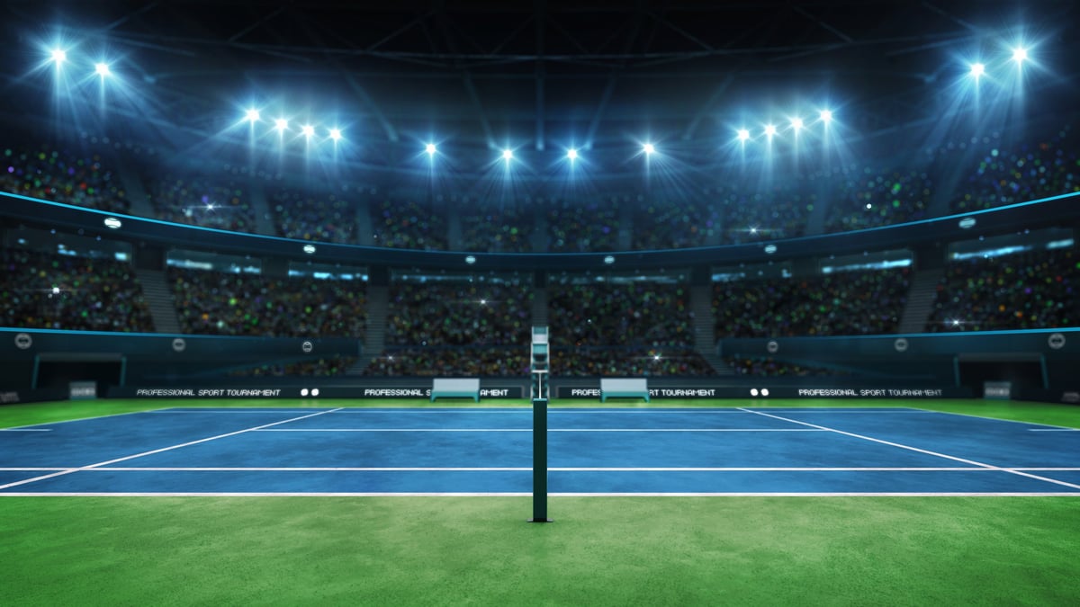 Professional tennis sport action with dramatic stadium atmosphere