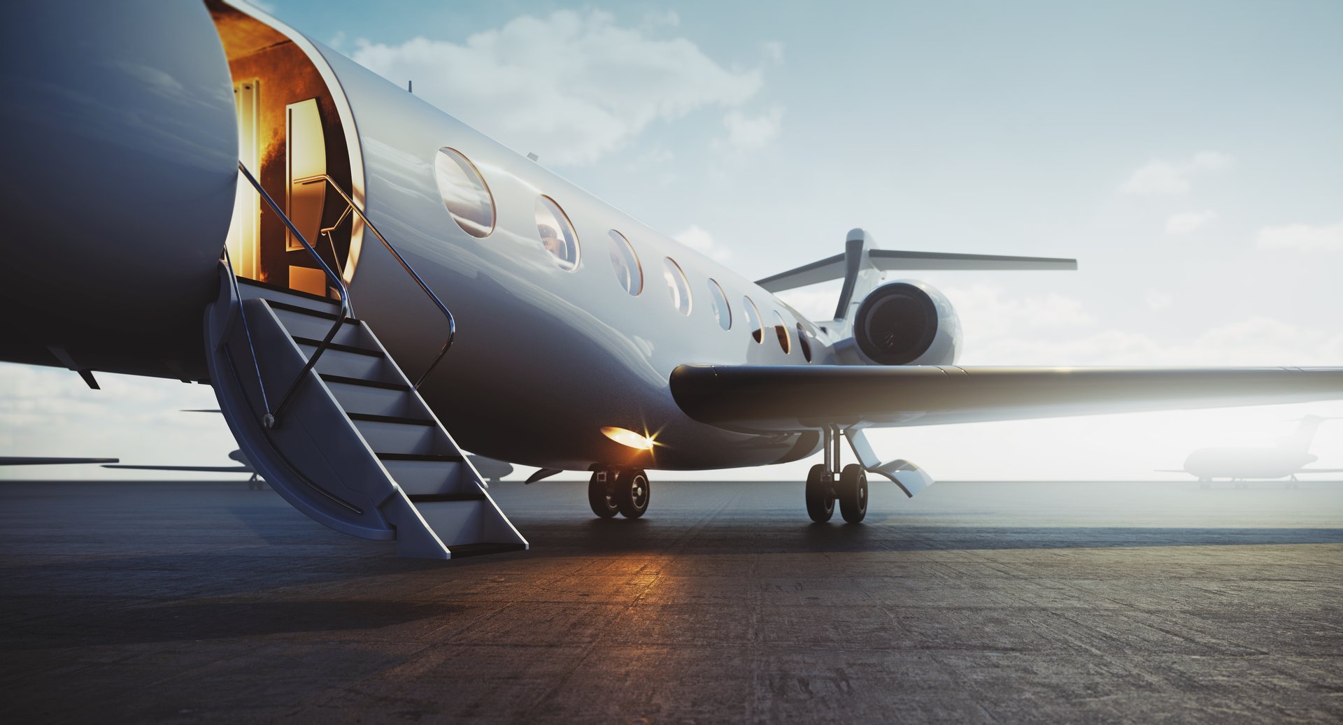 Business jet airplane parked on tarmac - luxury private aviation