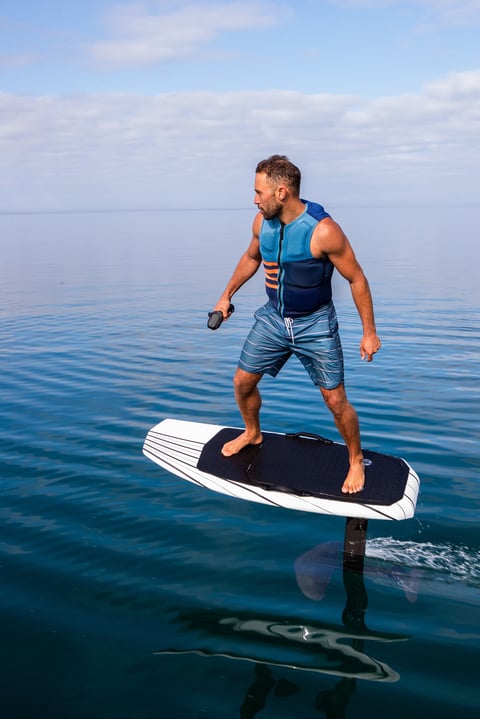 Electric hydrofoil board on lake