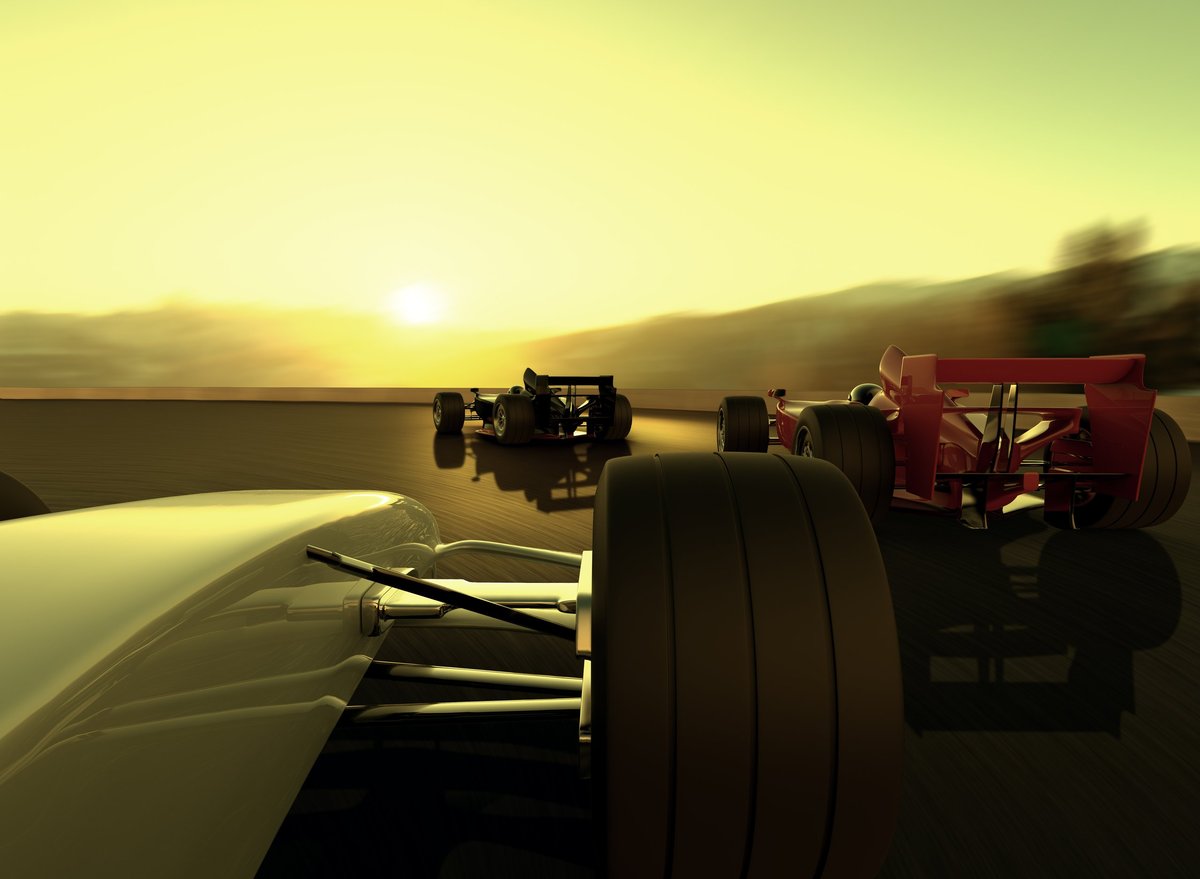3D rendering of self designed cars in a race with two cars chasing the leader