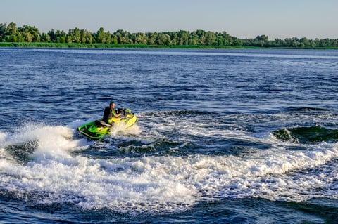 Man on personal watercraft Jet Ski