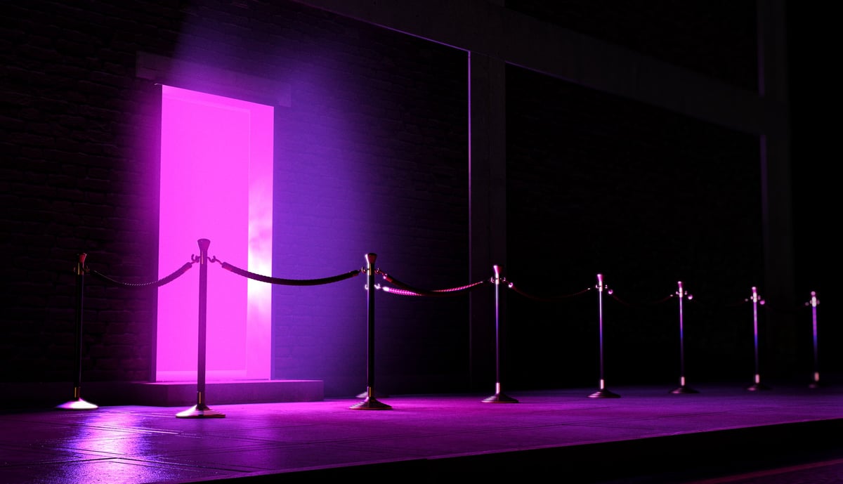 Exclusive nightclub entrance with velvet rope barrier and pink lighting, VIP access only