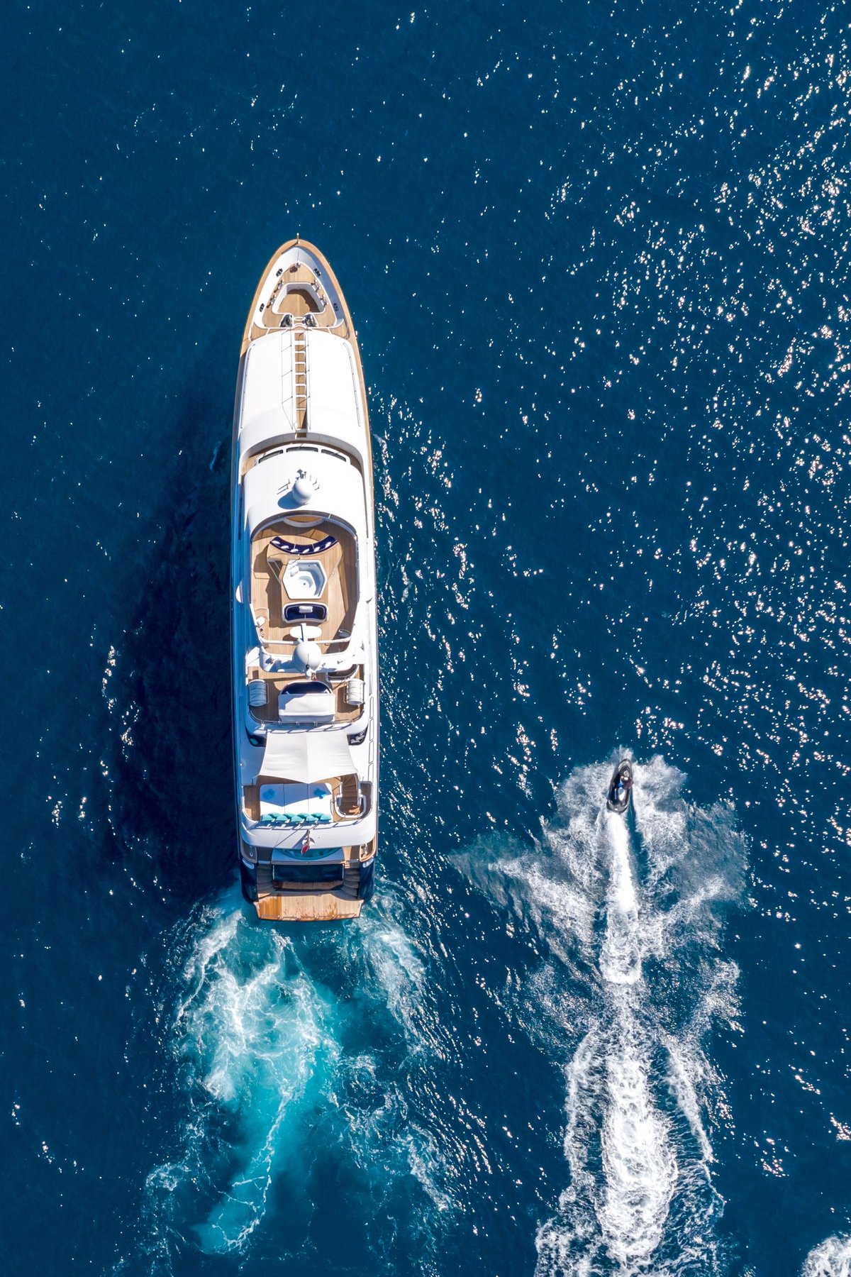 Private yacht and motorboat sailing in the Mediterranean ocean