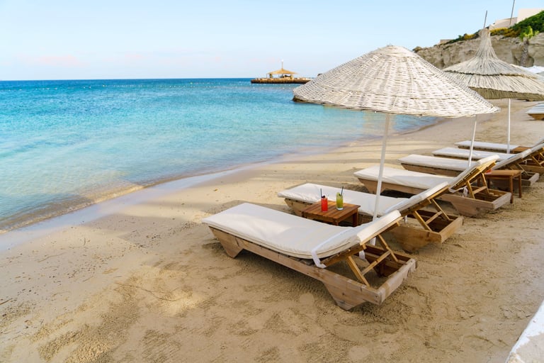 Playa Padre Marbella beach club luxury sunbeds
