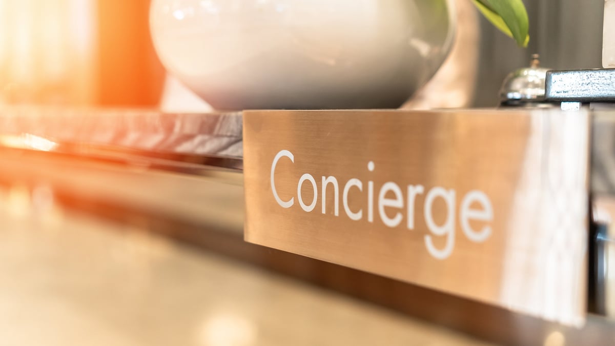 Concierge service reception desk counter at frontdesk of hotel with hospitality staff
