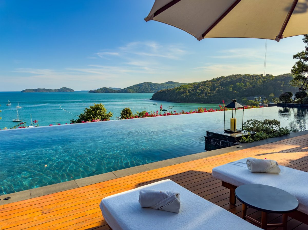 Pool view at luxury resort in Phuket Thailand with tropical setting ideal for family holidays