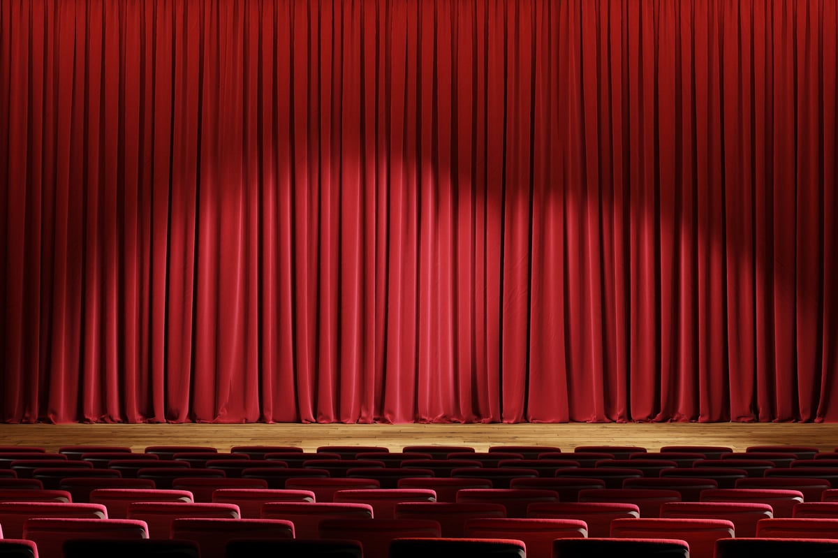 Empty theater stage with red velvet curtains and spotlights. 3d illustration