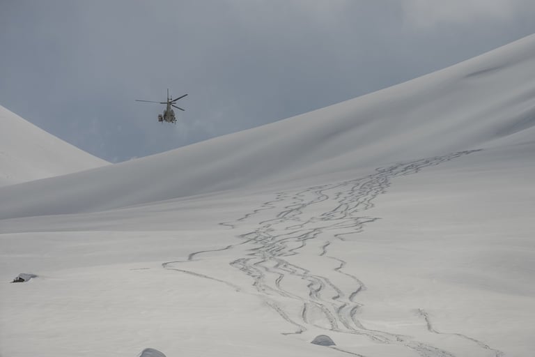 Selkirk Tangiers heli-skiing helicopter mountains powder