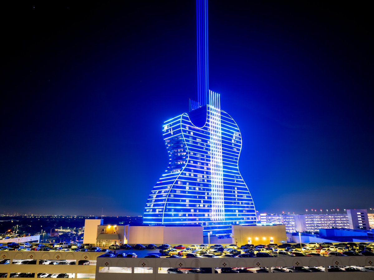 Seminole Hard Rock guitar hotel blue with neon laser lights at night