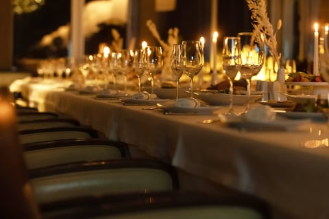 Luxury private chef dinner setup with candles and fine dining
