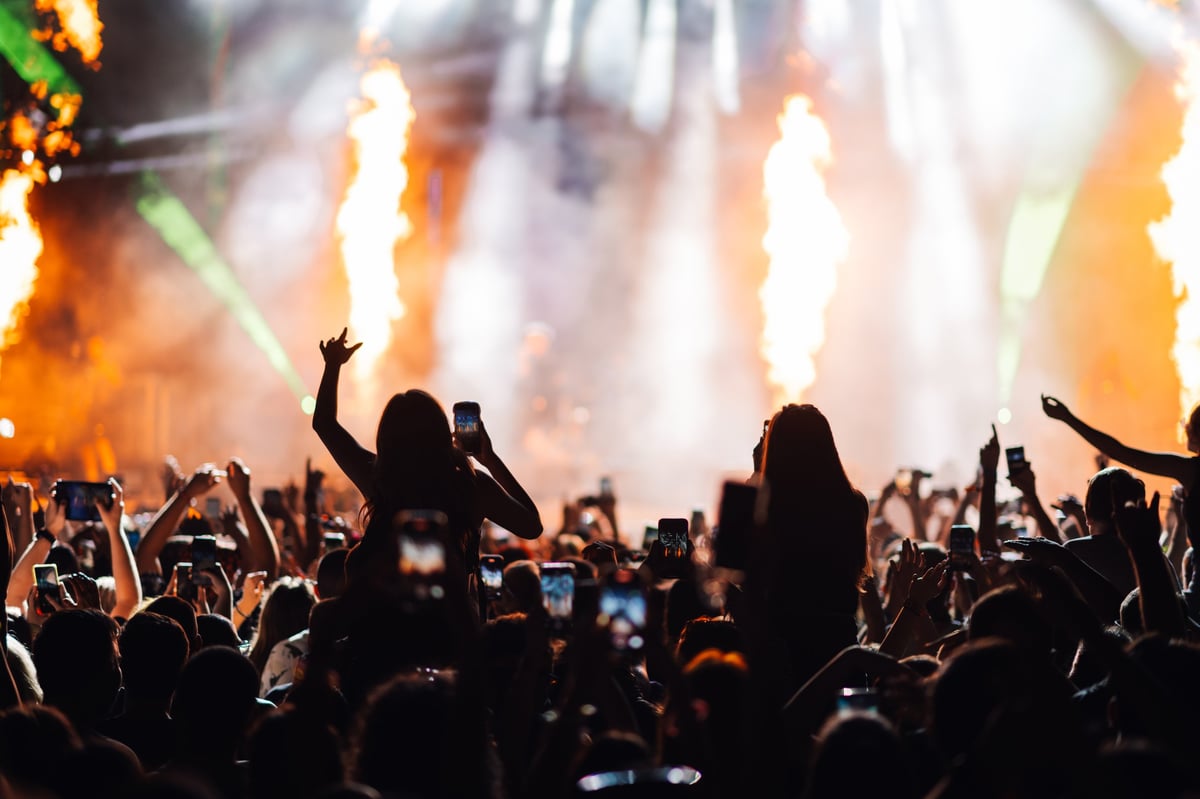 Vibrant concert stage with crowd and lights
