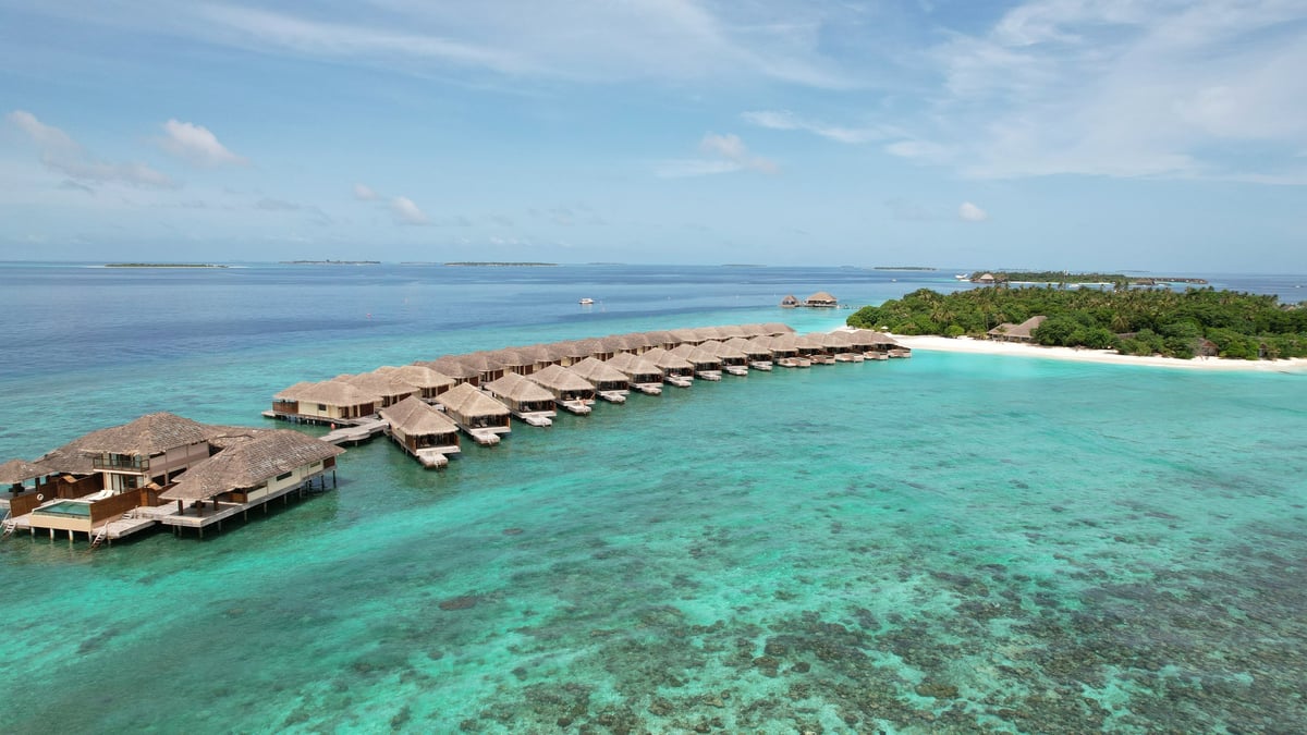 Cheval Blanc Randheli Maldives luxury overwater villa with crystal clear turquoise lagoon