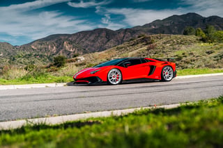 Red Lamborghini SV parked outside in Los Angeles