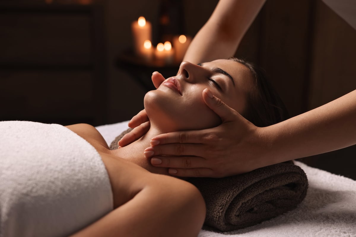 Woman enjoying face massage
