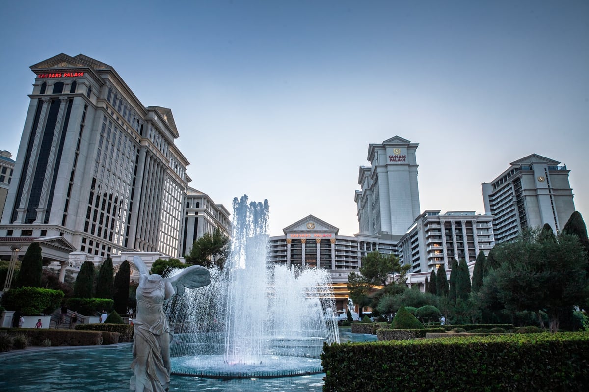 Dawn light bathes the classical colonnades and gardens of Caesars Palace Las Vegas