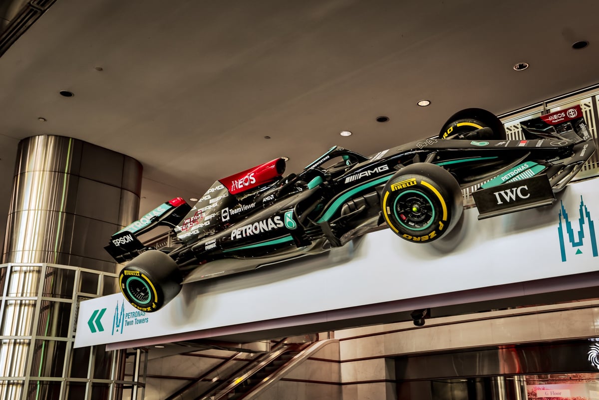 F1 race car on display at a venue in Kuala Lumpur