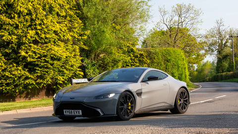 2018 Aston Martin Vantage V8 driving on an English country road