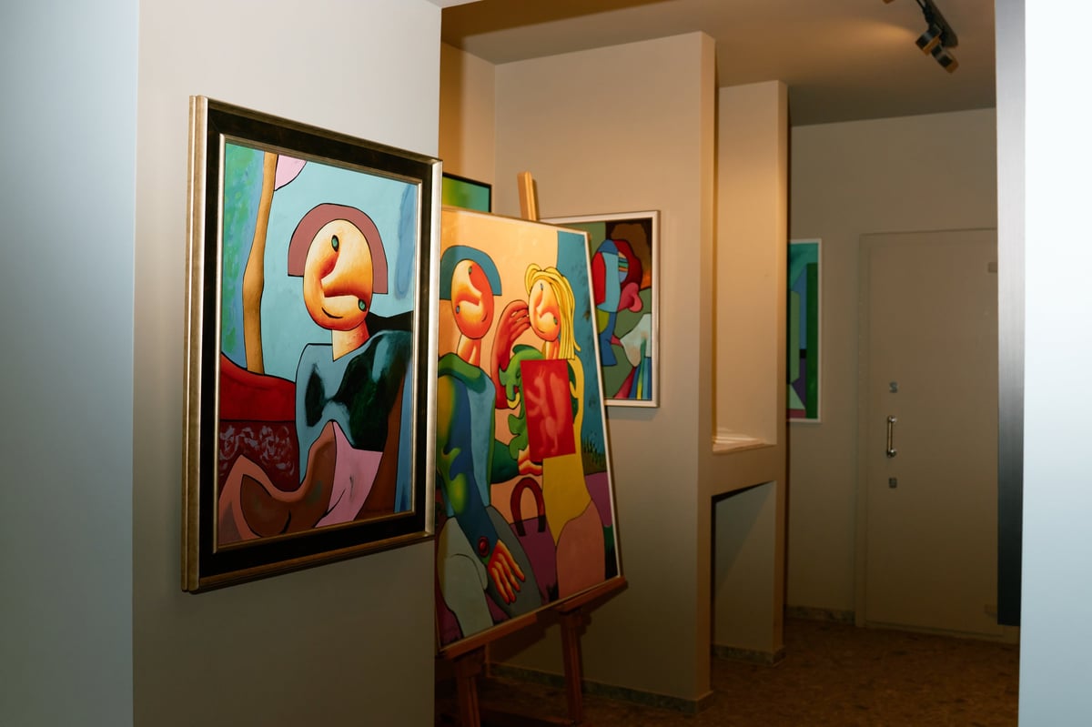 Featuring vibrant abstract paintings in modern art gallery