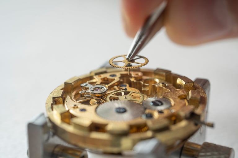 Professional watchmaker working on a vintage pocket watch
