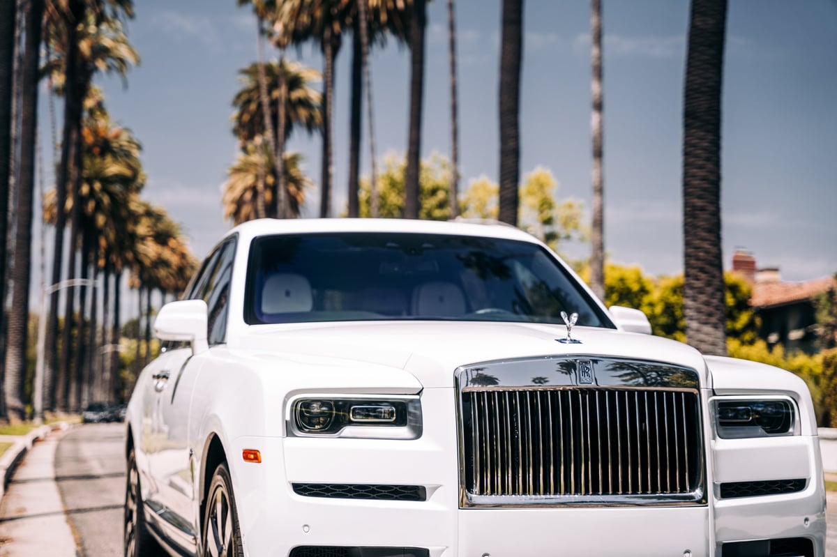 Rolls Royce Cullinan luxury SUV parked showing the front