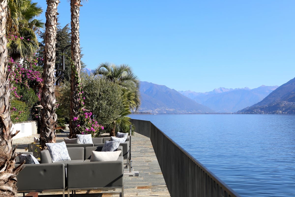 Lakefront terrace with mountain view, New Zealand alpine luxury