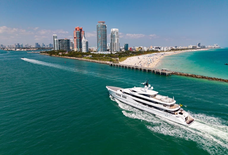 Luxury yacht cruising near Miami skyline