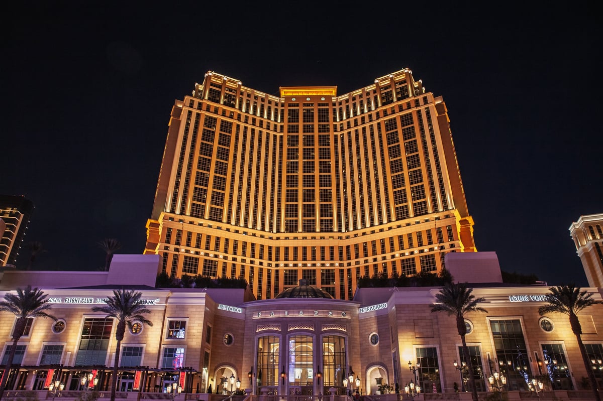 Captured head-on at street level, the monumental main tower of The Palazzo at The Venetian Resort Las Vegas