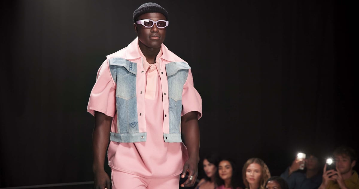 Fashion designer, runway and walking with black man in studio for showcase, clothes presentation and event