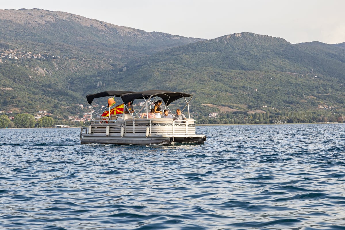 Pontoon boat on lake