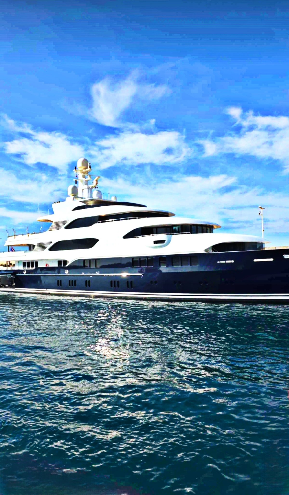 Superyacht sailing on calm ocean