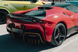 Exclusive sports car rally featuring Ferraris Lamborghinis and Maseratis