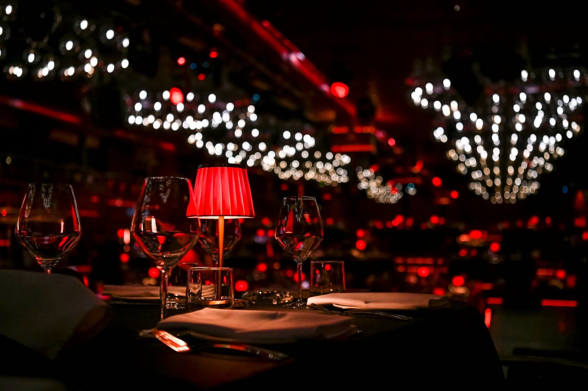 luxury elegant red table setting for dinner in a restaurant