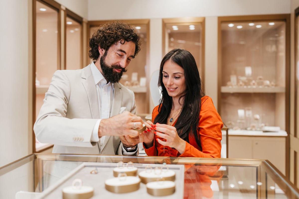 Couple at a luxury Parisian jewelry boutique