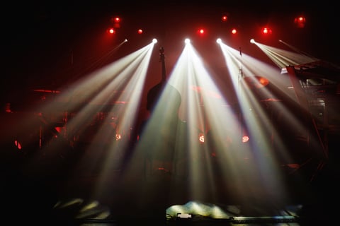 Concert stage with dramatic beams of light
