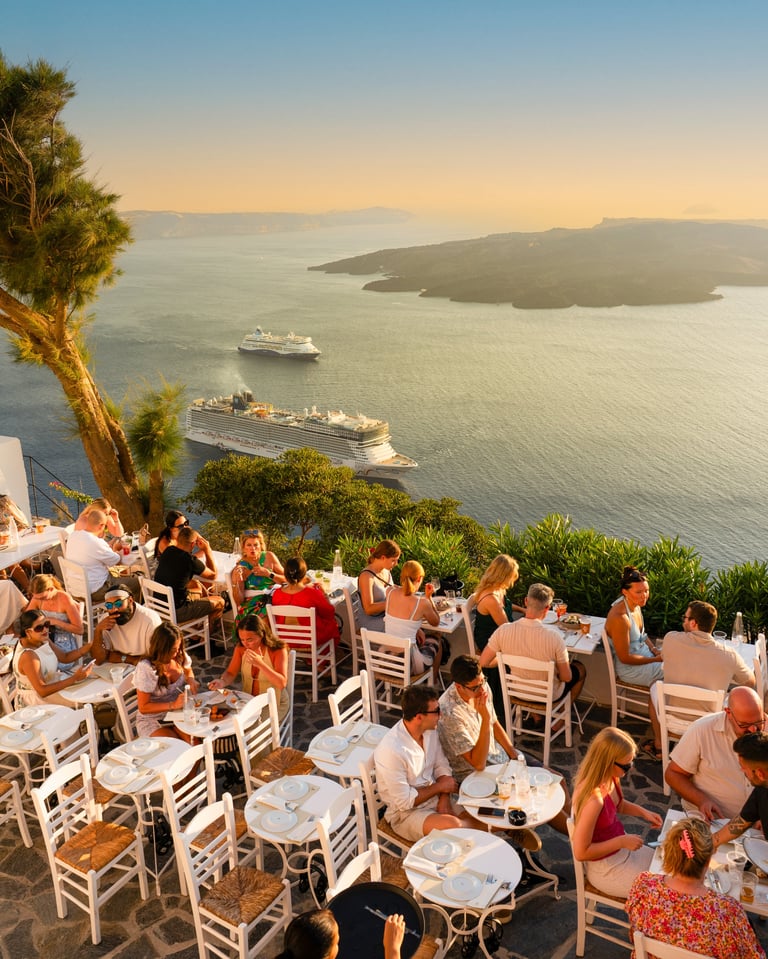 Tourists enjoying dinner with stunning sea view