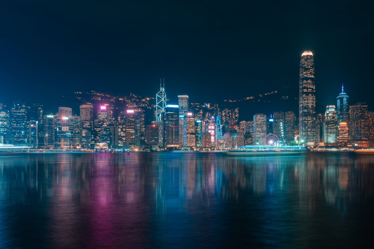 Panoramic view of Victoria Harbor and Hong Kong city view at night