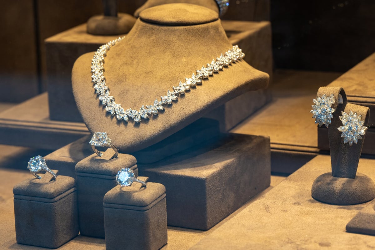 Diamond jewelry and luxury watches display, high-end retail window
