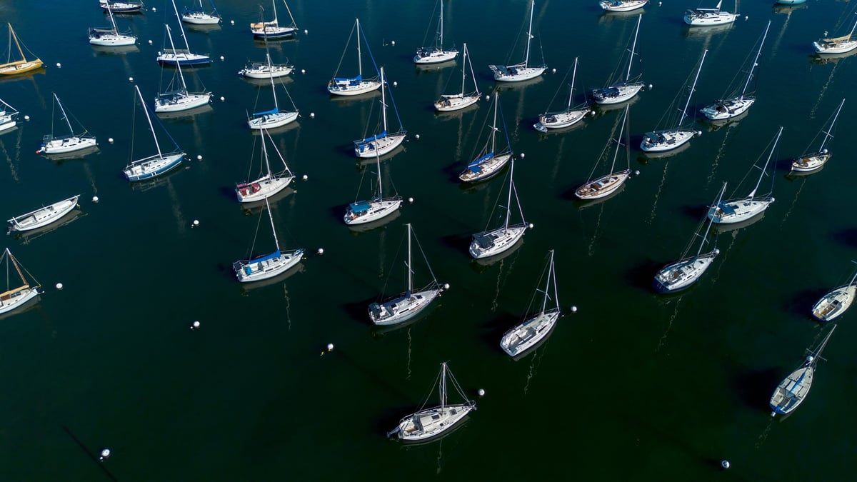 Overhead view of Sailboats in Marina harbor in sunny day