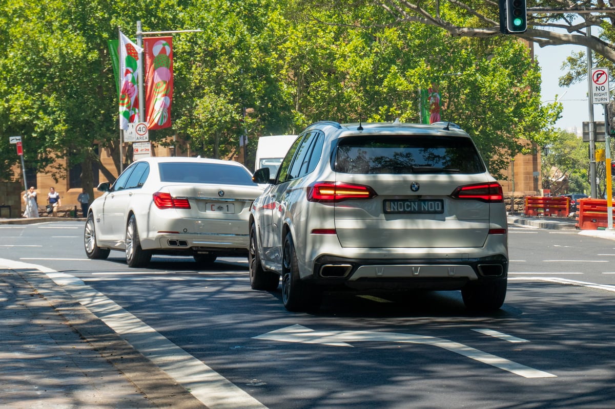 Australian PM BMW vehicle with bodyguard vehicles following