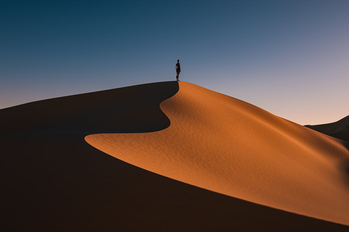 Dubai desert safari luxury experience sand dunes golden sunset