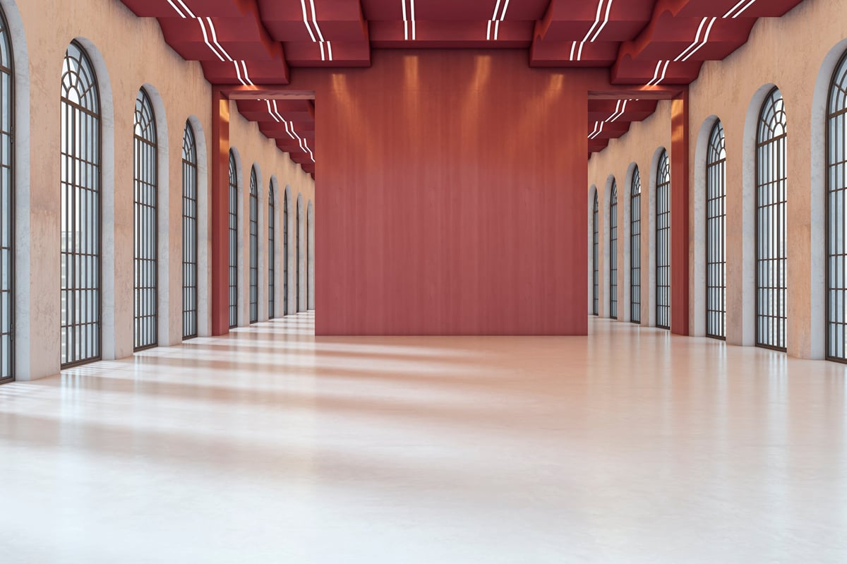 Spacious modern interior with large blank wall ideal for art exhibition