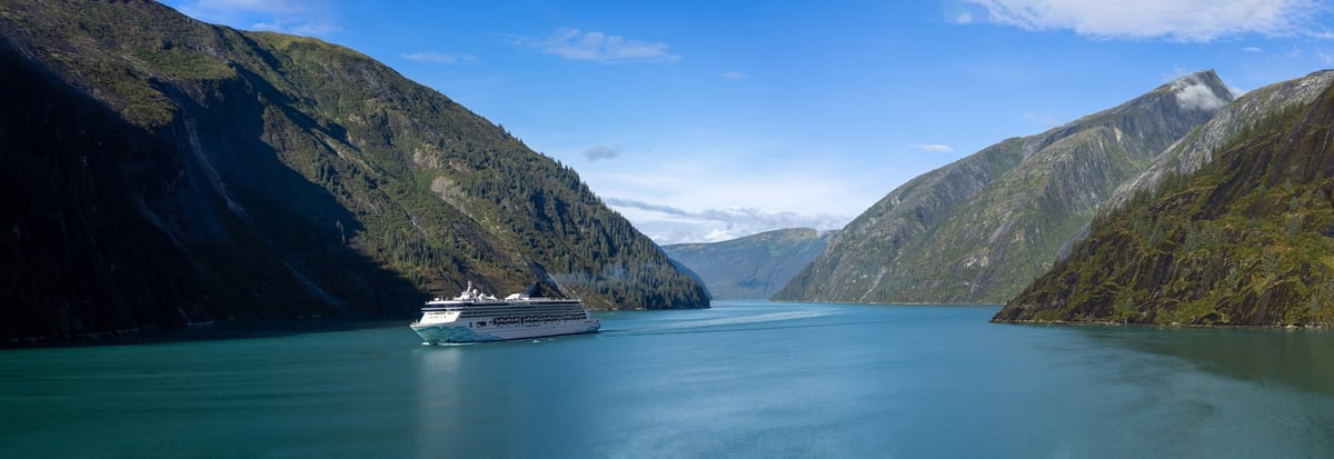Cruise through fjord and glacier with scenic mountain landscape