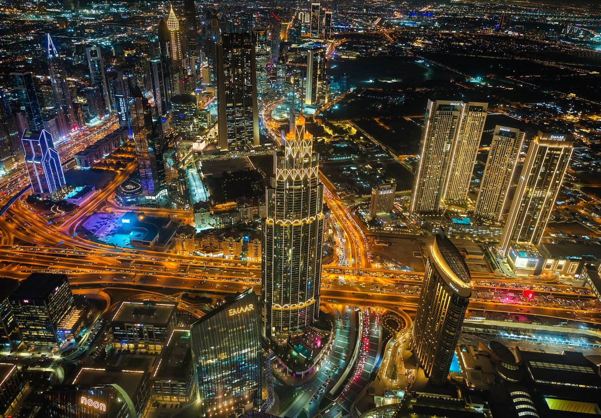 01 11 2026 - Dubai, UAE. Night aerial view of Dubai Business Bay skyline, drone photography capturing illuminated skyscrapers and modern city panorama