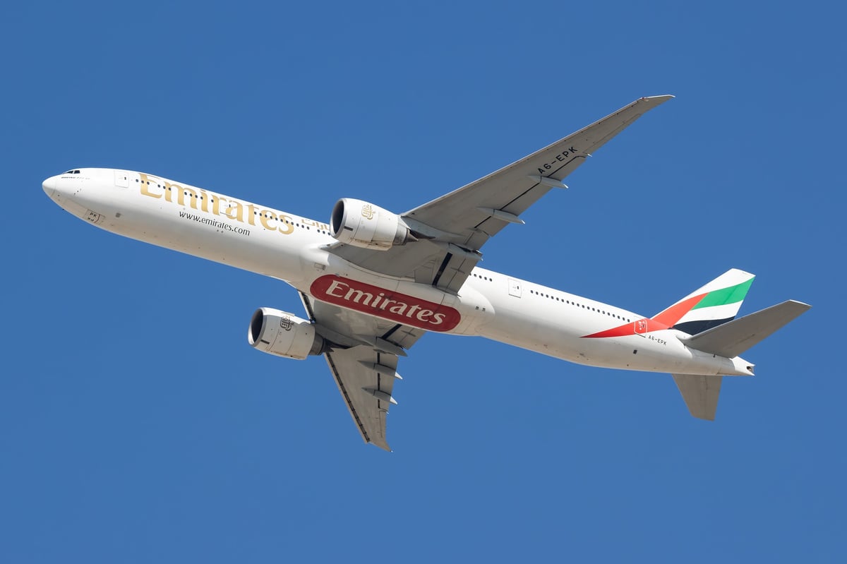 Dubai, UAE - November 12, 2025: Emirates Airlines Boeing 777-300ER passenger plane. Civil transport. Aviation and aircraft.