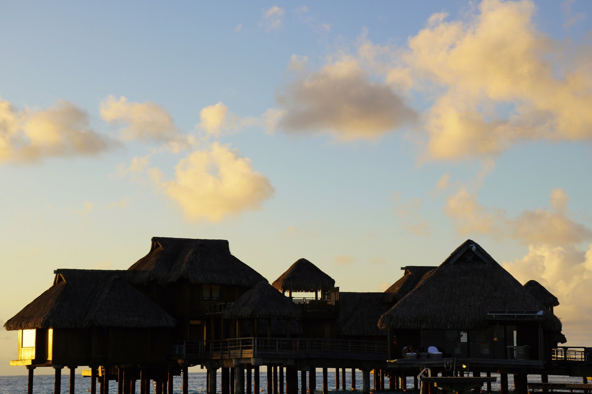 Bora Bora, Society Islands, French Polynesia — The bungalows belong to the Conrad Bora Bora Nui Resort and can be viewed by non-guests on a sunset boat excursion