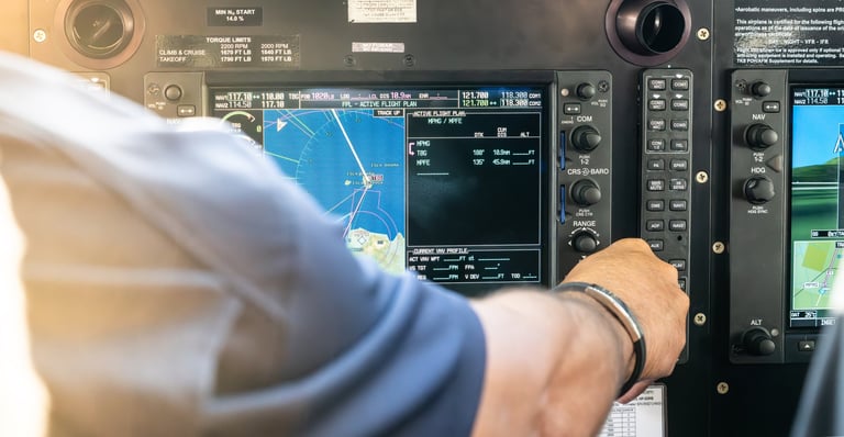 A pilot makes final adjustments to instruments prior to takeoff