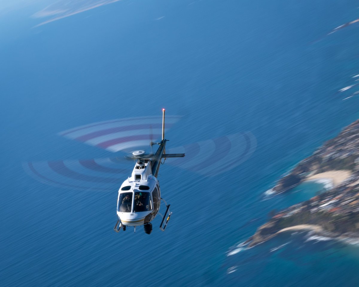 Helicopter (AS350) over the California coast, at very low shutter speed