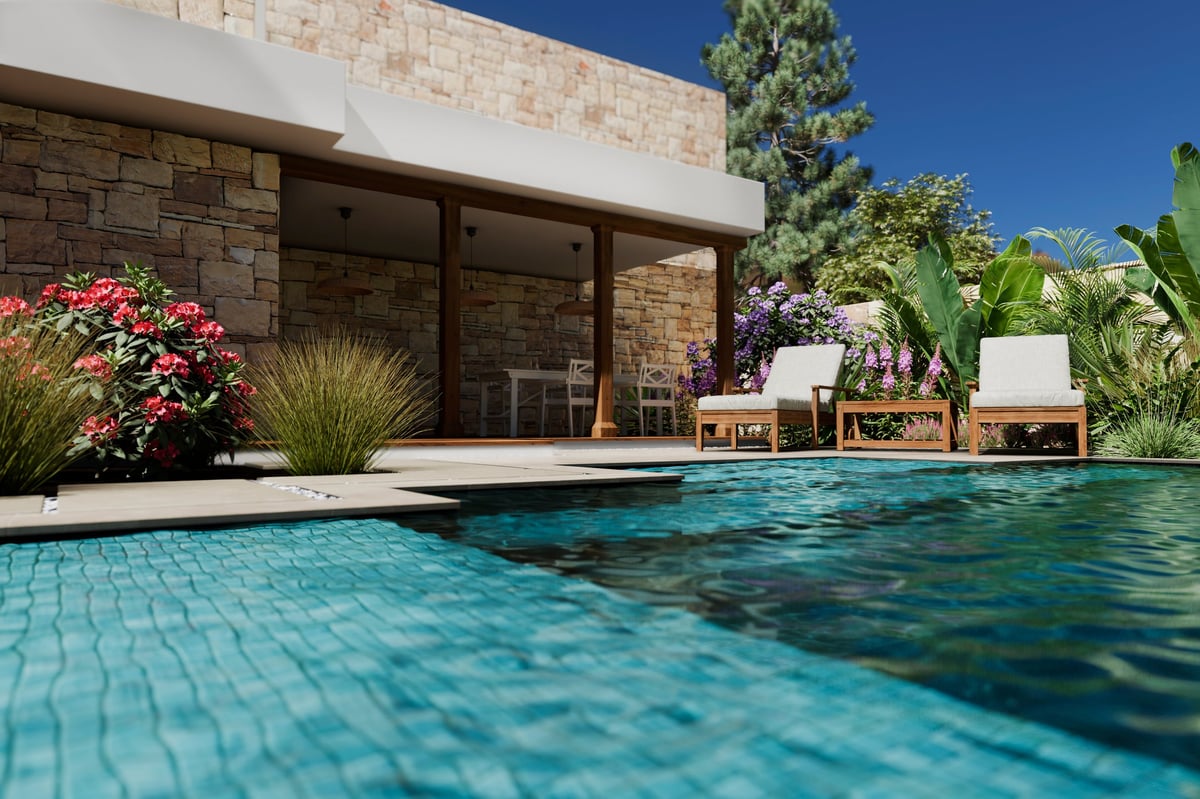 Luxury swimming pool with modern beach house architecture and tropical palms