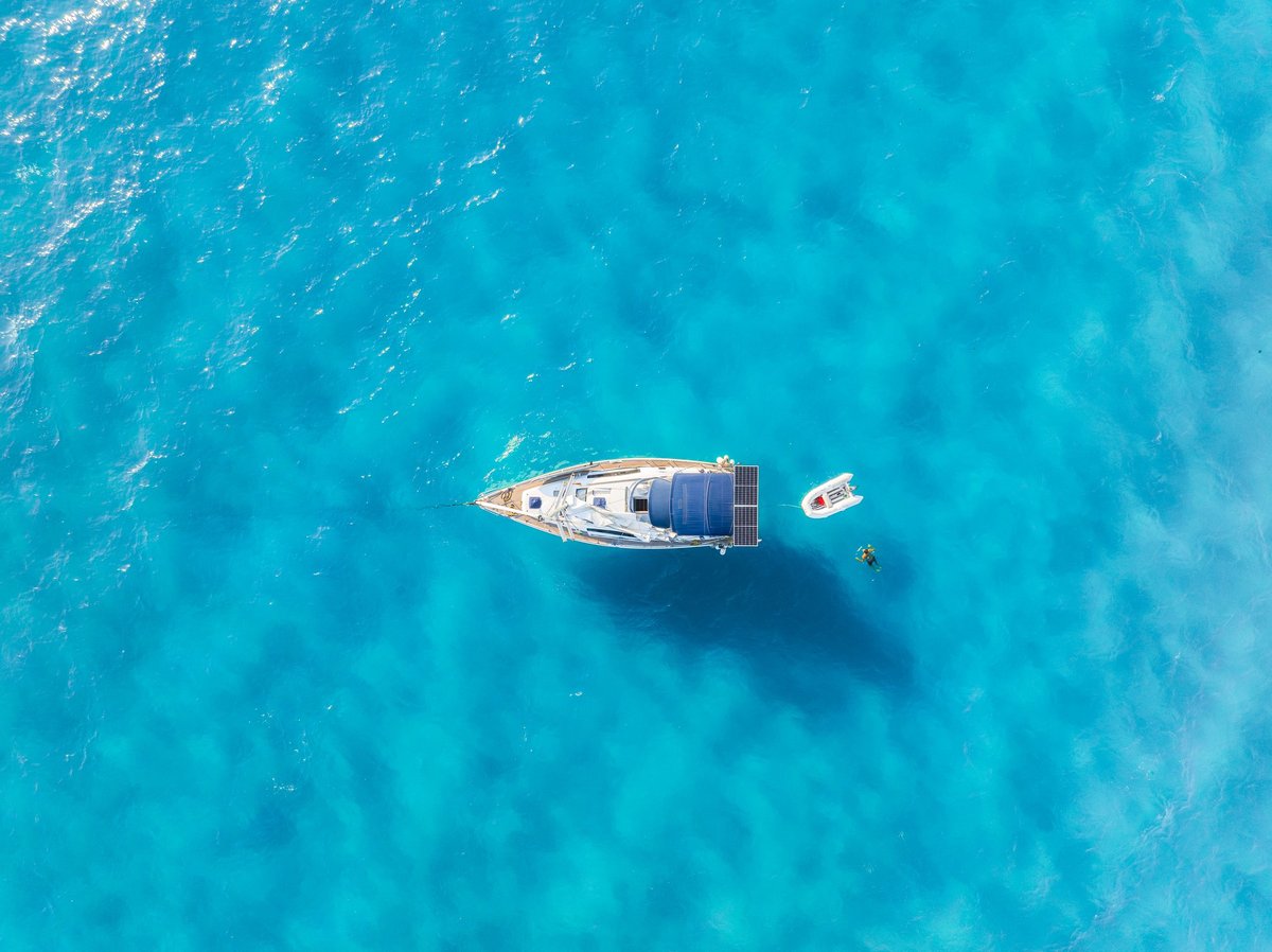 Luxury yacht on turquoise ocean water